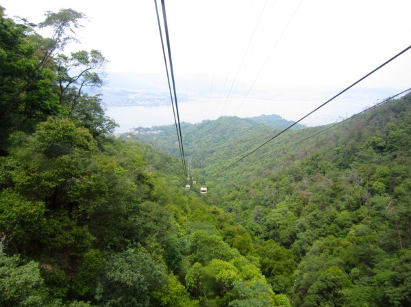 Catching the cable car up Mt Misen.
