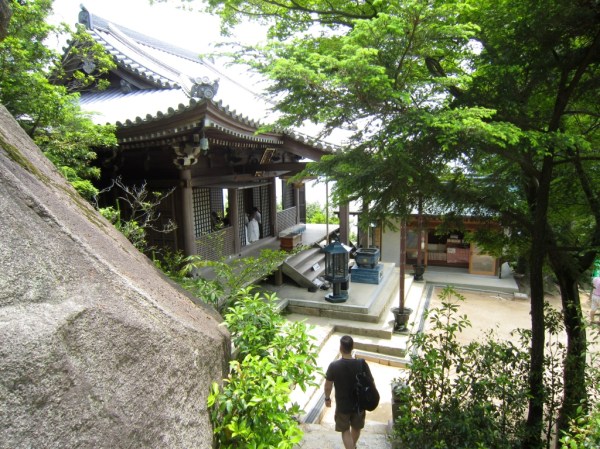 Daishi-no temple at the top of Mt Misen - you can just see the monks inside the temple beginning their midday prayers.