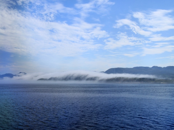 The island shrouded in cloud.