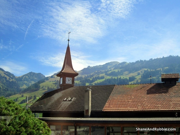 The Zweisimmen train station, with epic views behind.